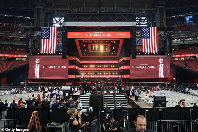 GLENDALE, ARIZONA - SEPTEMBER 21:  Attendees gather in the stands as media set up ahead of the memorial service for political activist Charlie Kirk at State Farm Stadium on September 21, 2025 in Glendale, Arizona. Kirk, the CEO and co-founder of Turning Point USA, was shot and killed on September 10th while speaking at an event during his "American Comeback Tour" at Utah Valley University. (Photo by Joe Raedle/Getty Images)