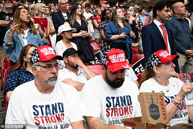 People gather to attend a memorial service for slain conservative commentator Charlie Kirk at State Farm Stadium, in Glendale, Arizona, U.S., September 21, 2025. REUTERS/Caitlin O'Hara