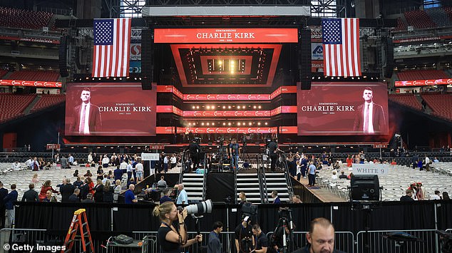 GLENDALE, ARIZONA - SEPTEMBER 21:  Attendees gather in the stands as media set up ahead of the memorial service for political activist Charlie Kirk at State Farm Stadium on September 21, 2025 in Glendale, Arizona. Kirk, the CEO and co-founder of Turning Point USA, was shot and killed on September 10th while speaking at an event during his "American Comeback Tour" at Utah Valley University. (Photo by Joe Raedle/Getty Images)