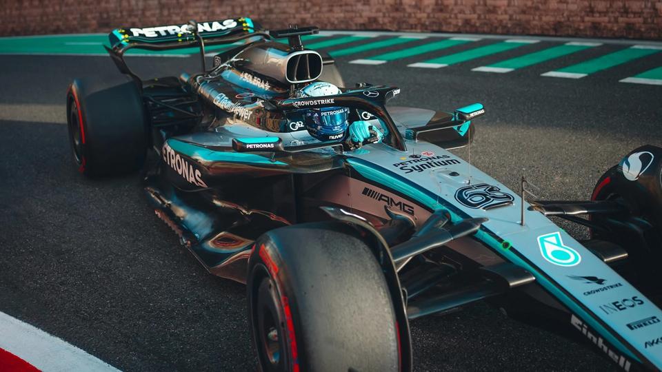 Three quarters of the Mercedes-AMG Petronas F1 car on a track cornering