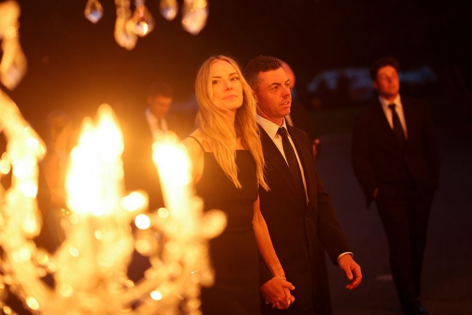 Rory McIlroy of Team Europe and wife Erica Stoll arrive for the the Ryder Cup Teams' Welcome Dinner. Carl Recine/Getty Images