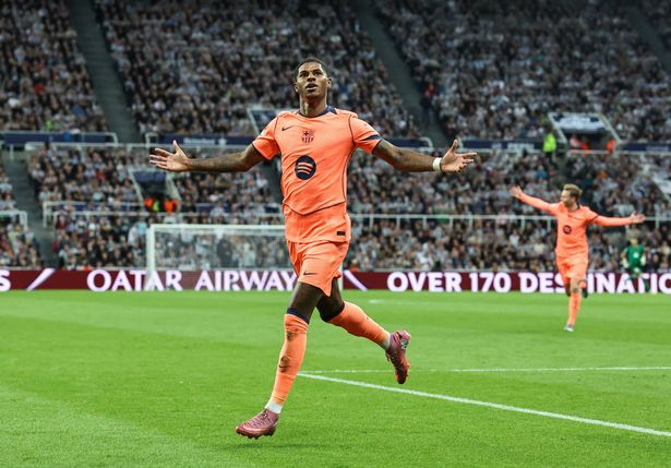 Marcus Rashford celebrates completing a brace for Barcelona against Newcastle in the Champions League