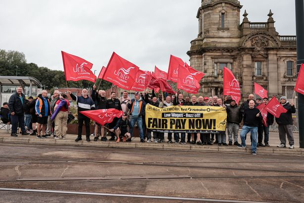 Workers on the picket line in Oldham