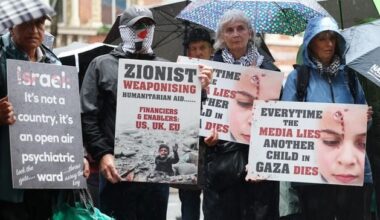 Pro-Palestine protestors gather outside BBC in Belfast