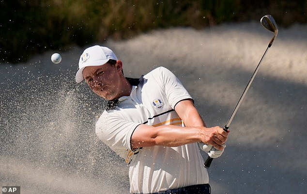 Europe's Matthew Fitzpatrick hits from the bunker on the eighth hole during their singles match on the Bethpage Black golf course at the Ryder Cup golf tournament, Sunday, Sept. 28, 2025, in Farmingdale, N.Y. (AP Photo/Robert Bukaty)