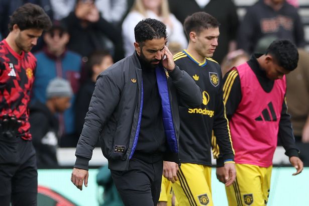 Man United boss Ruben Amorim looks dejected