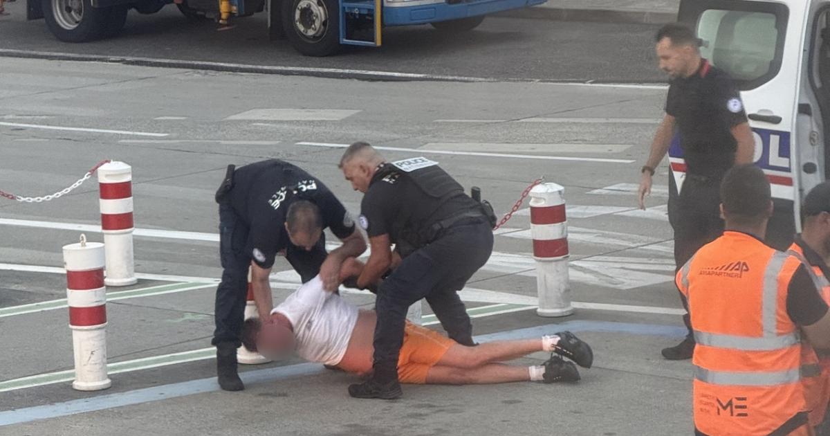 WATCH: Man escorted off Ryanair plane after 'chaotic' flight