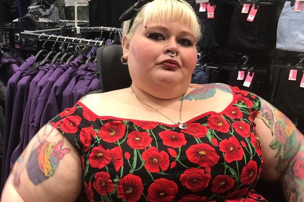 Danni shopping in her wheelchair