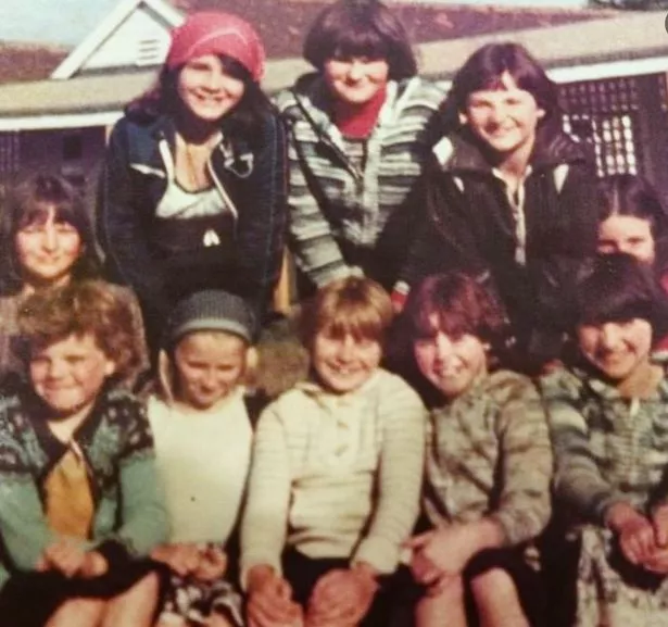 Smiling faces - children visiting "Salford by the Sea" in Prestatyn in the 1960s.