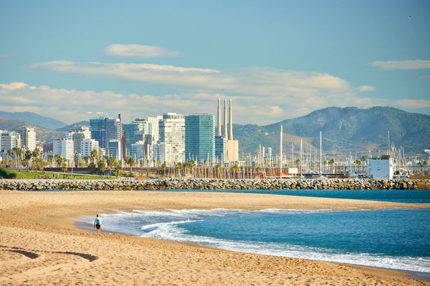 Morning on the beach of Barceloneta in Barcelona, Spain