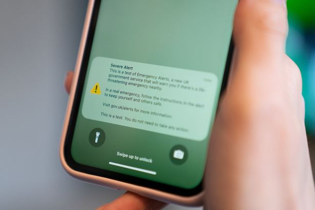A person receiving an emergency alert test