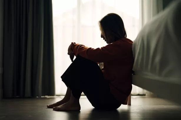 In silhouette of woman sad depression in bedroom.