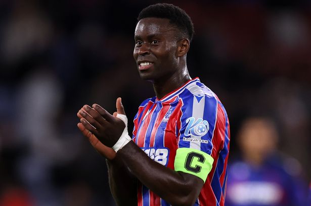 LONDON, ENGLAND - AUGUST 21: Marc Guehi of Crystal Palace applauds the fans following the UEFA Conference League Play-off Round First Leg match between Crystal Palace and Fredrikstad at Selhurst Park on August 21, 2025 in London, England. (Photo by Ryan Pierse/Getty Images)