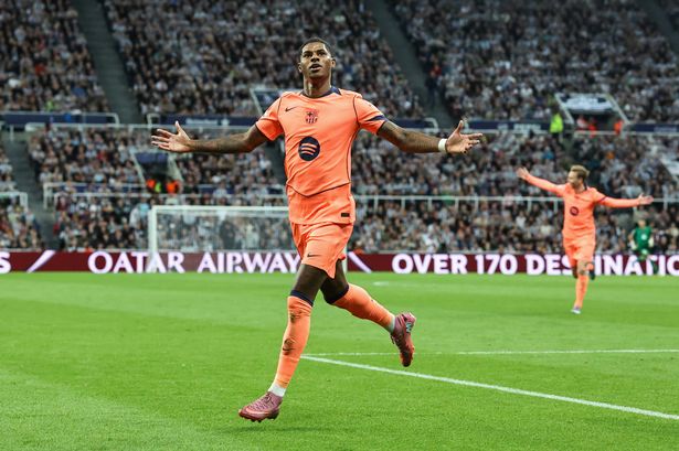 Marcus Rashford celebrates completing a brace for Barcelona against Newcastle in the Champions League