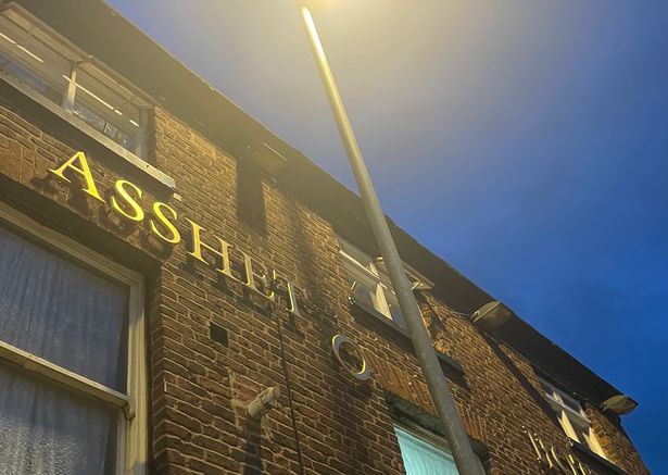 Sign on side of the Assheton Arms Hotel 