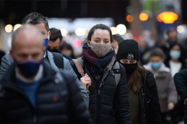 People wearing masks to protect themselves from Covid