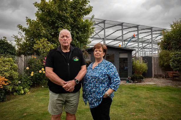 Carol and Steve Retford, pictured in the rear of their garden, say the development has been "life-changing