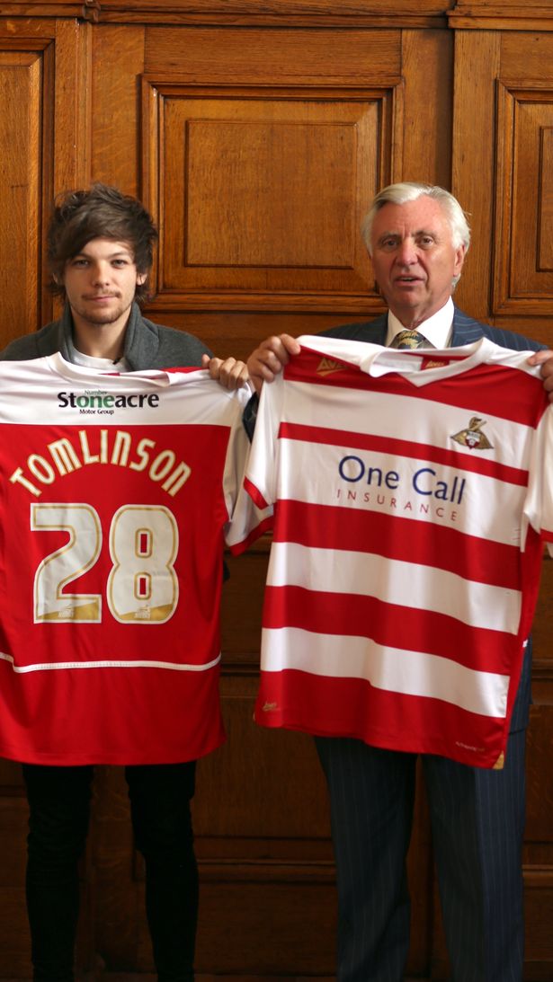 Louis pictured with the club’s former chairman John Ryan (pictured)