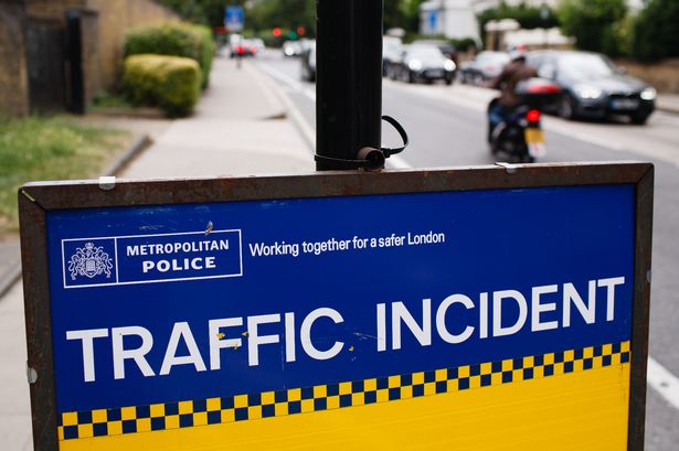 A Metropolitan Police 'Traffic Incident' information board 