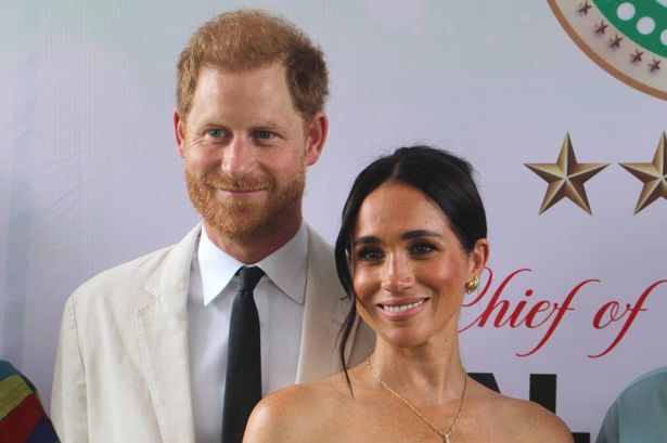 Prince Harry, Duke of Sussex, and Britain's Meghan, Duchess of Sussex, 