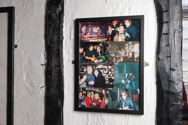 One of several montages of photographs of stars who visited the Apsley Cottage pub on its walls. 