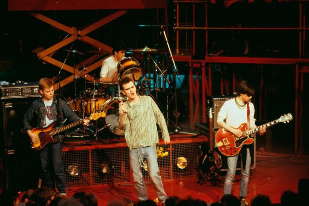 The Smiths (L-R; Andy Rourke, Mike Joyce,  Morrissey, and Johnny Marr) performing live on stage in 1984