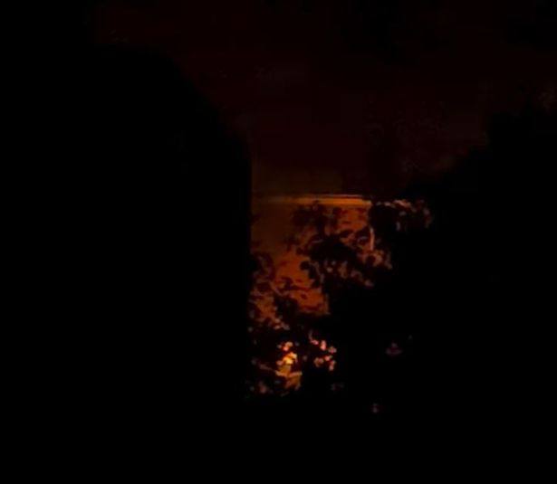 Flames seen rising from the vehicle