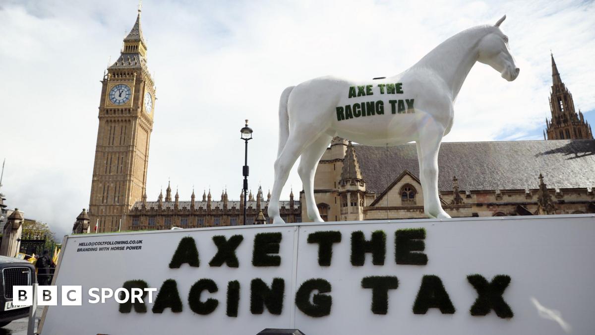 A statue of a horse with the 'Axe The Racing Tax' was part of a protest against the government's proposed tax rise on betting on horse racing
