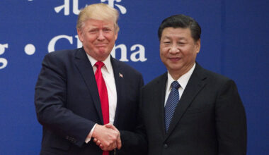 In this file photo taken on Nov.8, 2017, United States President Donald Trump (left) and China's President Xi Jinping shake hands during a business event at the Great Hall of the People in Beijing.