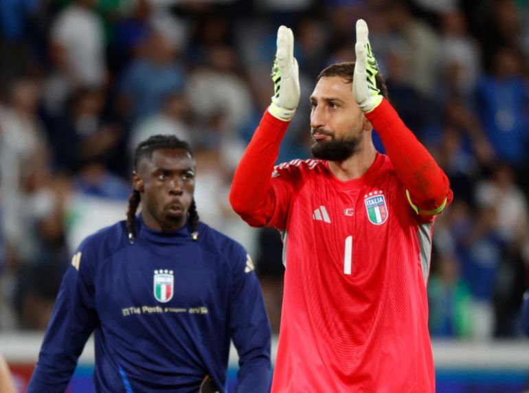 Italy's Gianluigi Donnarumma celebrates after the World Cup qualifier against Estonia