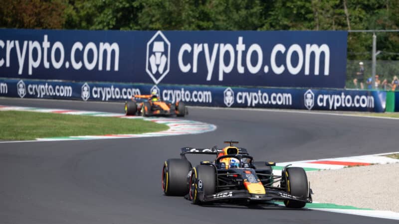 Max Verstappen (Red Bull-Honda) leads Lando Norris (McLaren-Mercedes) in the 2025 Italian Grand Prix