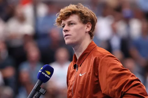 Jannik Sinner of Italy speaks after losing to Carlos Alcaraz of Spain during their Men's Singles Final match on Day Fifteen of the 2025 US Open at USTA Billie Jean King National Tennis Center