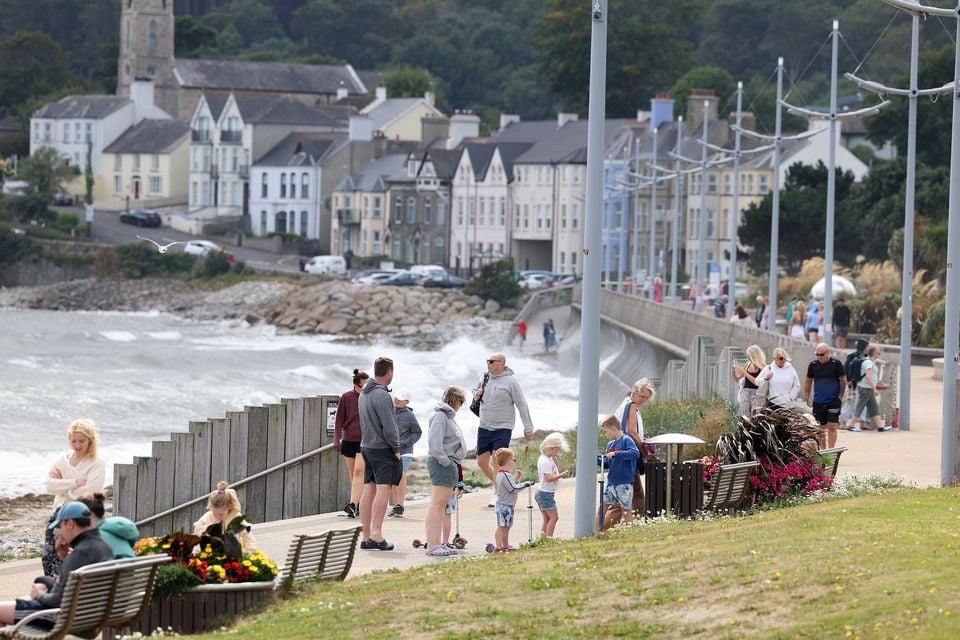People enjoy the bank holiday weather in Newcastle, Co. Down, last month. Picture: Jonathan Porter/PressEye