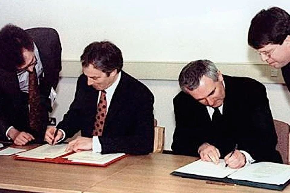 Tony Blair and Bertie Ahern signing the 1998 Good Friday Agreement