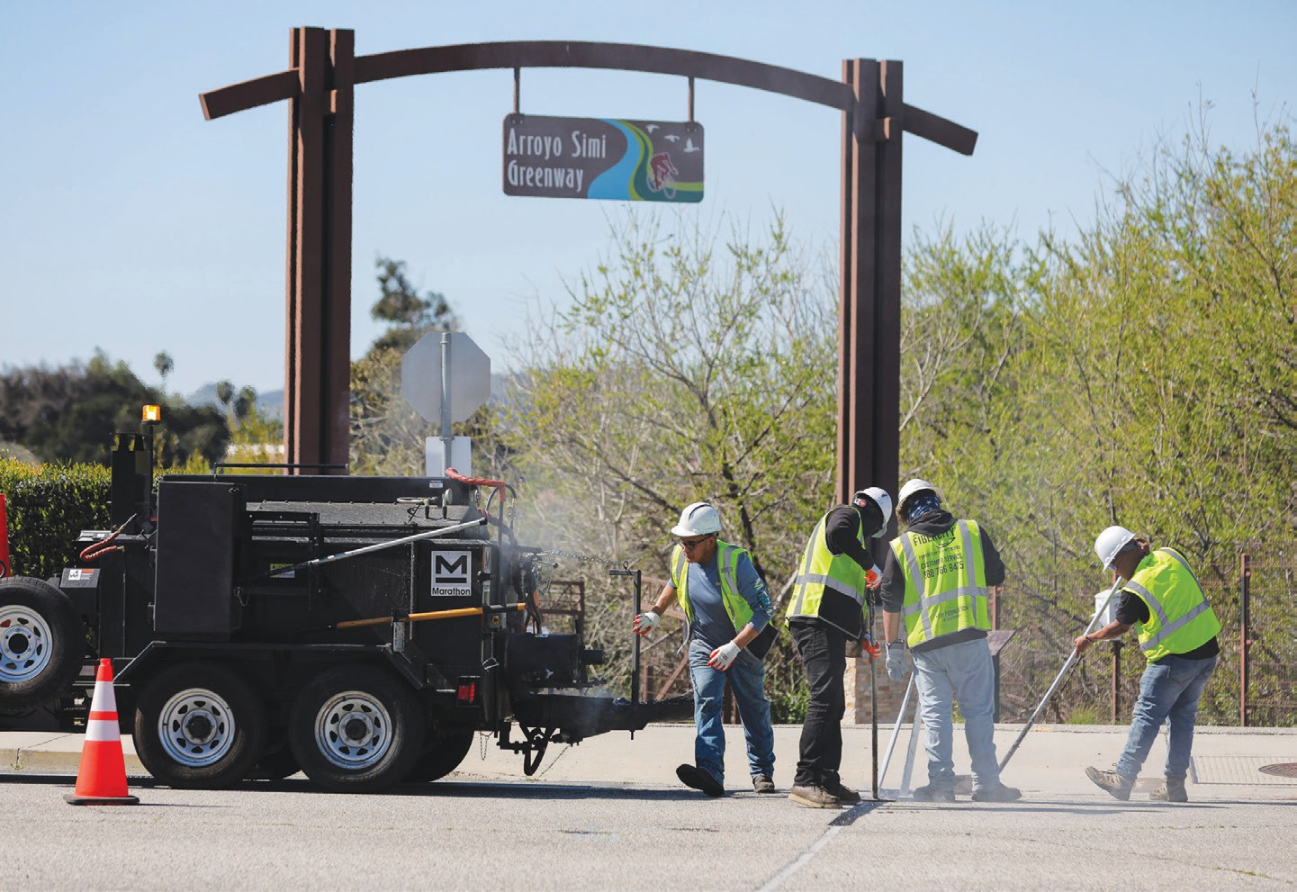 WORK IN PROGRESS—Crews cover a microtrench with asphalt as part of SiFi Networks’ fiber-optic installation project along Sequoia Avenue on Feb. 28 in Simi Valley. MICHAEL COONS/Acorn Newspapers