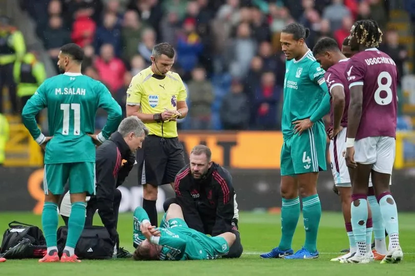 Alexis Mac Allister is treated during the Premier League match between Burnley and Liverpool.
