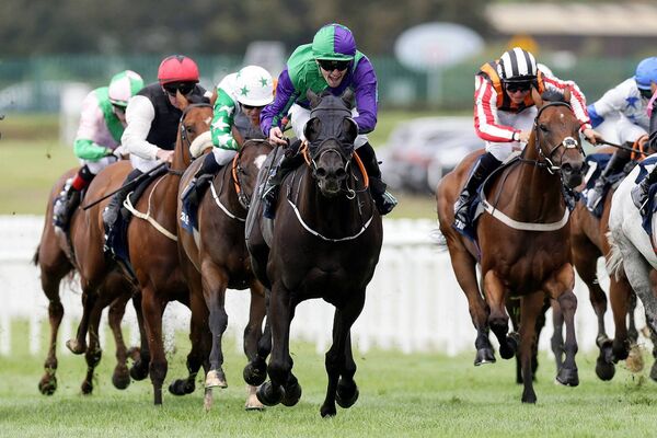 Luke McAteer onboard Tango Flare wins the Irish Stallion Farms EBF Bold Lad Sprint Handicap Photo: ©INPHO/Laszlo Geczo