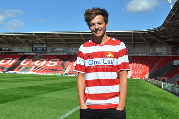 Louis Tomlinson in a Doncaster Rovers FC jersey