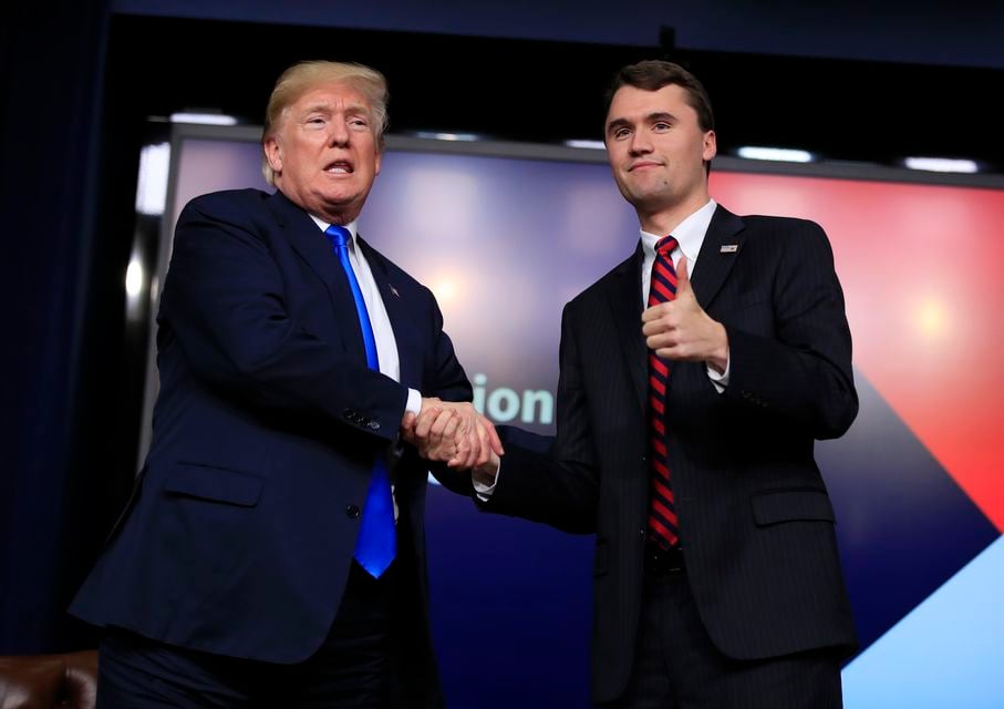 President Donald Trump shakes hands with Charlie Kirk (Manuel Balce Ceneta/AP)