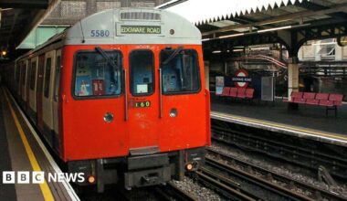 A library photo of a Tube train pulling into Edgware Road station.
