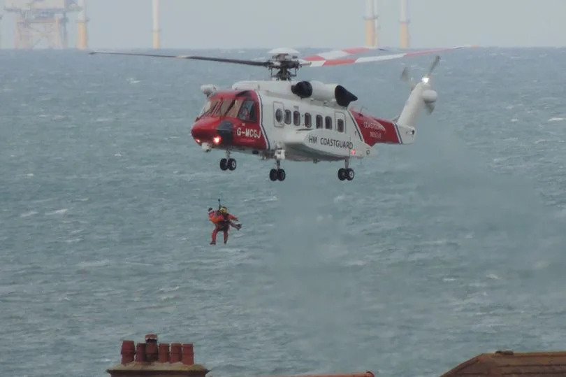 Coastguard helicopter at the Little Orme in Llandudno -Credit:Mike Parry, from the A55 Traffic, Incidents, Information group