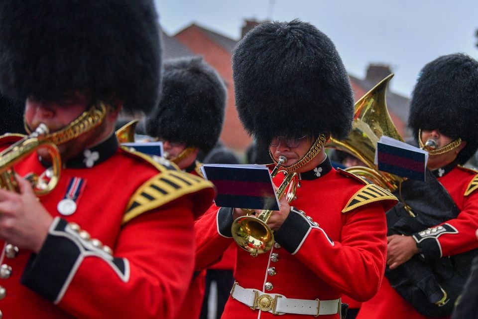 The Irish Guards today were on Parade today as they are laying down their regimental colours at St. Mark's Parish Church in Dundela, East Belfast. This event is a historic, one-off event to mark the regiment's 125th anniversary and will be the only set of their colours to reside outside of London.  The Parade which took place along Belmont Road featured the Band of the Irish Guards, Pipes and Drums Irish Guards and Campbell College Pipe Band along with the Irish Guards Association & Army Cadet force.

Photo - Andrew McCarroll/ Pacemaker Press