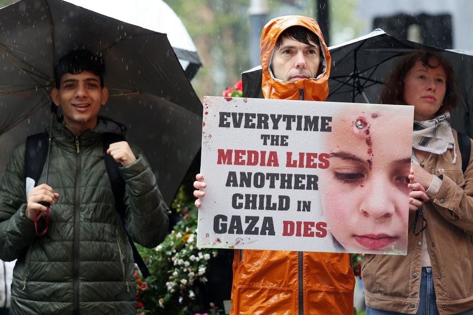 Pro-Palestinian protesters gather outside the BBC Northern Ireland office on Bedford Street in Belfast city centre. Picture by Jonathan Porter/PressEye