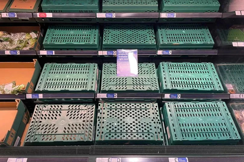 General image of empty shelves at a Tesco supermarket