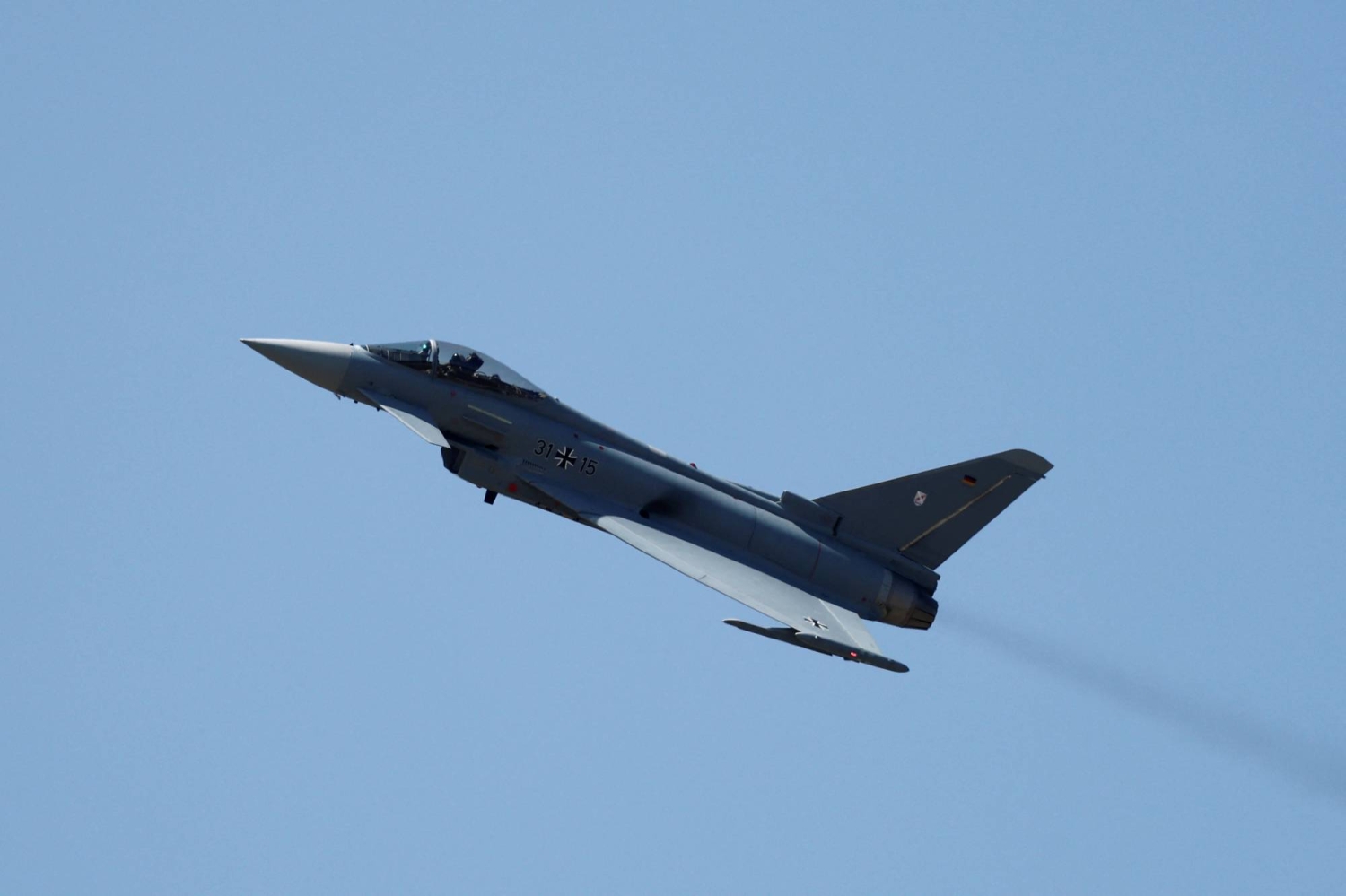 France to deploy three jets to 'help protect Polish airspace,' Macron says