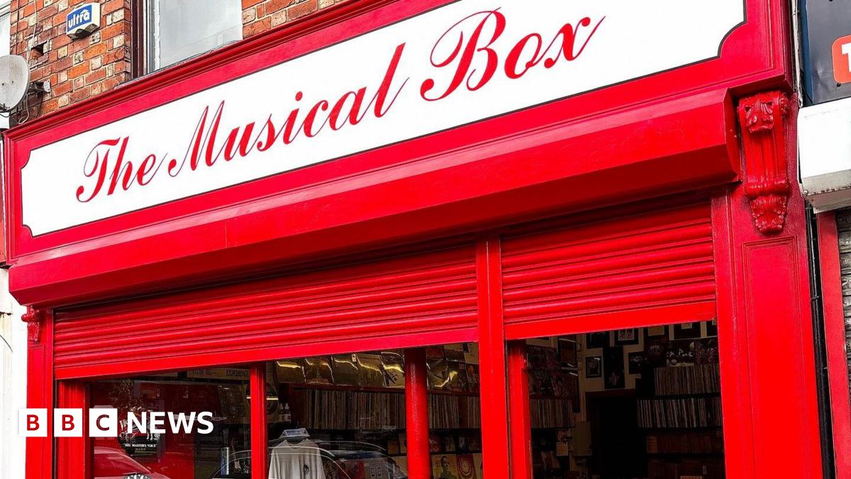 The red frontage of The Musical Box record shop in Liverpool.