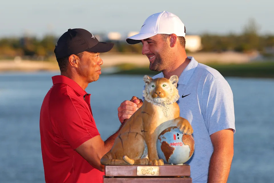 Tiger Woods of the United States congratulates Scottie Scheffler of the United States after the final round of the Hero World Challenge 2024 at Albany Golf Course on December 08, 2024 in Nassau, Bahamas. (Photo by Kevin C. Cox/Getty Images)