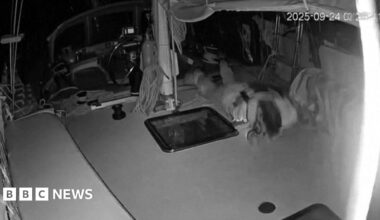 Screengrab of video footage released by the Global Sumud Flotilla (GSF) purportedly showing a man diving for cover after a drone attack on a Gaza-bound vessel off the coast of Crete (24 September 2025)