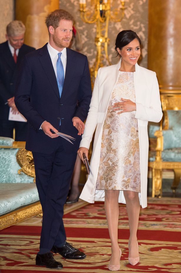 Prince Harry and pregnant Meghan Markle