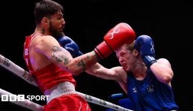 Callum Makin lands a jab on the chin of Rami Kiwan